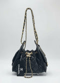 Divabags black grained calfskin Chanel 25 bucket bag with gold hardware and chain strap.