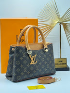 Louis Vuitton Riverside Handbag